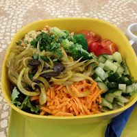 Huge raw vegan salad with so many tasty vegetables inside! at World Food Barn in Paris