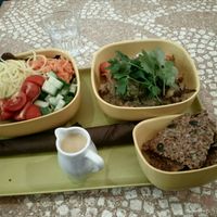 Bowl with raw crackers at World Food Barn in Paris
