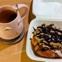 "Cookie Monster" Roll (take out, with my own tea) at Cinnaholic in Meridian