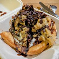 The Cookie Monster Cinnamon Roll (takeout) at Cinnaholic in Meridian