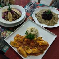 Bobo de castanhas de caju with black rice is top right at Dona Fulo in Guaruja