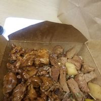 BBQ CHICKEN, PEPPER STEAK ON TOP OF RICE AND BEANS. at Sun Life Total Health  in Bronx