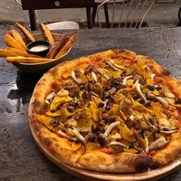 Smokey pizza and sweet potato fries   at The Organik Kitchen Saigon in Ho Chi Minh City