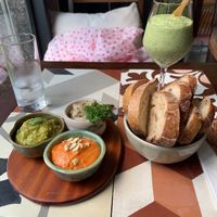 Spur dough, dips, and a smoothie. at The Organik Kitchen Saigon in Ho Chi Minh City