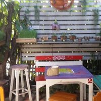 inside seating at Khun Kae's Juice Bar in Chiang Mai