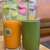 Carrot-Mango-Lemon-Pineapple (left) and Spinach-Avocado-Ginger-Lemon-Banana smoothies (right) at Khun Kae's Juice Bar in Chiang Mai