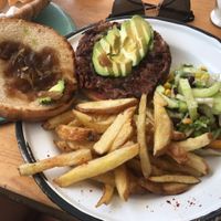 bean burger with side salad and fries at Cafe Mouja in Taghazout