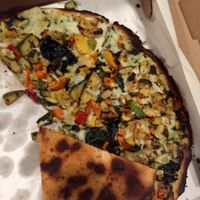burnt pesto & veg pizza, eatable aside from crust at Pazzo Wood Fired Pizza in Wading River