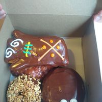 Voodoo, peanut, Bavarian and apple fritter at Voodoo Doughnut in Universal City
