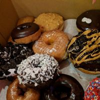 The vegan dozen (minus the ones we ate) at Voodoo Doughnut in Universal City