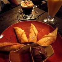 Banana fritters and raw avocado chocolate mousse.  at Pure Vegan Heaven in Koh Phangan