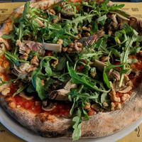 Mushrooms, artichokes, walnuts and arugula at Olio Doliva in Sofia
