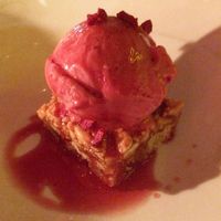 Salty toffee almond cake served with cherry sorbet ice cream. at Bistro Bananas in Stockholm