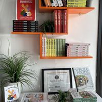 The Book shelf😄  at Vibe Organic Kitchen & Juice in Newport Beach