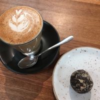 Chai latte and hazelnut energy ball at Cedar Bakery in Preston