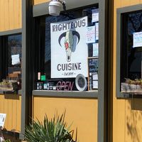 Front window (during Covid19) at Righteous Cuisine in Grand Haven