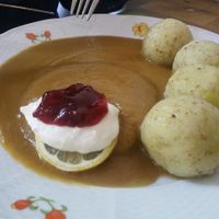 "Svíčková" - typical Czech gravy with tempeh, dumplings, (vegan) cream and cranberries at U Zelenina in Prague
