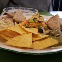 a selection of starters - Hummus, Pesto Zucchini, no-egg salad at U Zelenina in Prague