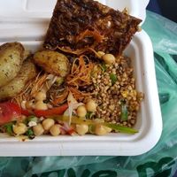 onion bread, rosemary potatoes, buckwheat salad, singapore noodles & chickpea sala at Natural Bar & Kitchen in Birmingham