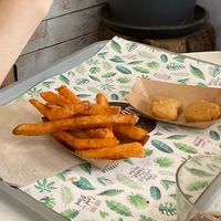 Nuggets and sweet potato fries  at Khambú Quart in Valencia
