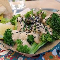 You can switch fries for brocoli with peanut butter sauce. Yummy ! at Khambú Quart in Valencia