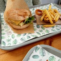 Breaded chicken style burger and fries at Khambú Quart in Valencia