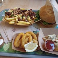 Classic burger onion rings gyoza taboo fries at Khambú Quart in Valencia