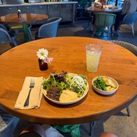 Black Bean Falafel Bowl with Hummus and Olive Oil Roasted Veggies 🥦   at Flower Child in Del Mar