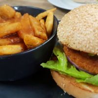 Chicken burger with loaded fries, gravy at MooFree Burgers  in Maroochydore