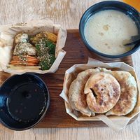 Stir-fry dumplings, veggies and soup at Mo Mo - Saint-Gilles in Brussels