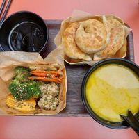 'Lunchtime formula' with steamed veggies and soup of the day. Momos can be steamed or pan-fried. (11€ at noon, more expensive in the evening) at Mo Mo - Saint-Gilles in Brussels