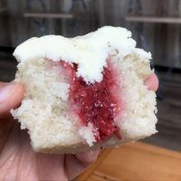 Strawberry puree filling in the Strawberry Shortcake cupcake at Molly's Cupcakes in Des Moines