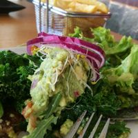 special bun less pumpkin & buckwheat burger (guacamole and ragen josh) with salad and fries. at Gourmet Burger Room in Marbella