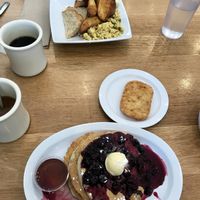 Pancakes with berry compote and breakfast scramble with potatoes, and hash patty at J Selby's in St Paul