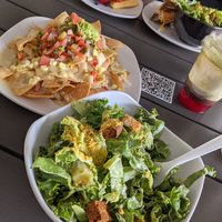Large vegan caesar salad, vegan nachos, Beets by Greg juice at MidMod Cafe in Palm Springs