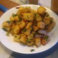 (Hot starter on Lebanese cuisine menu) Batata hara: Potatoes with garlic, cilantro, lemon and spice at Ilili in Tenerife