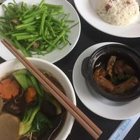 Noodle soup with vegetables, stir fried water spinach with garlic, tofu skins in black pepper sauce & coconut fried rice. at Veggie Saigon - Vietnam & Thai Vegan Restaurant in Ho Chi Minh City