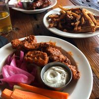 Two types of vegan wings with vegan ranch and fries  at Benson Brewery in Omaha