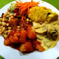 Chickpeas, legumes, mushrooms and salad at Lisbon Vegan Restaurante in Lisbon
