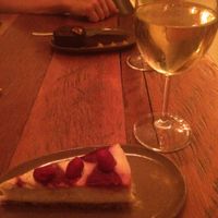 Raspberry cheesecake and wine! at Vibe Cafe in Phnom Penh