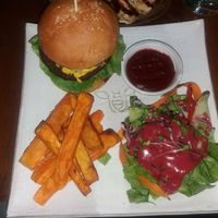 Nomad Burger with sweet potato fries at Vibe Cafe in Phnom Penh