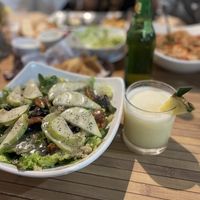 Salad and piña colada  at 100% Natural in Playa Del Carmen