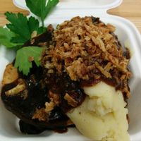 "Steak" and cheez pie and mash, topped with crispy onions, by Young Vegans at Hackney Downs Vegan Market in East London