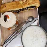 Macaroon, chocolate pastry and latte  at VG Pâtisserie in Paris