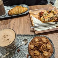 Flower croissant and pizza at VG Pâtisserie in Paris