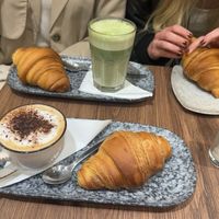 Cappuccino, matcha latte, croissants  at VG Pâtisserie in Paris