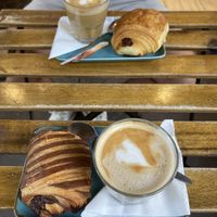 Pain au chocolat and pain au chocolat praline with two cafe au lait  at VG Pâtisserie in Paris