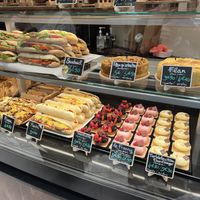 Madeleines, stuffed pastry rolls, sandwiches, paninis, pizza, flans and more patisserie   at VG Pâtisserie in Paris