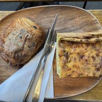 Crookolatine (croissant filled with and baked under chocolate chip cookie dough) and quiche  at VG Pâtisserie in Paris