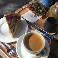 Quiche and pizza for late risers, haha, all croissants were already gone by the time we got there  at VG Pâtisserie in Paris